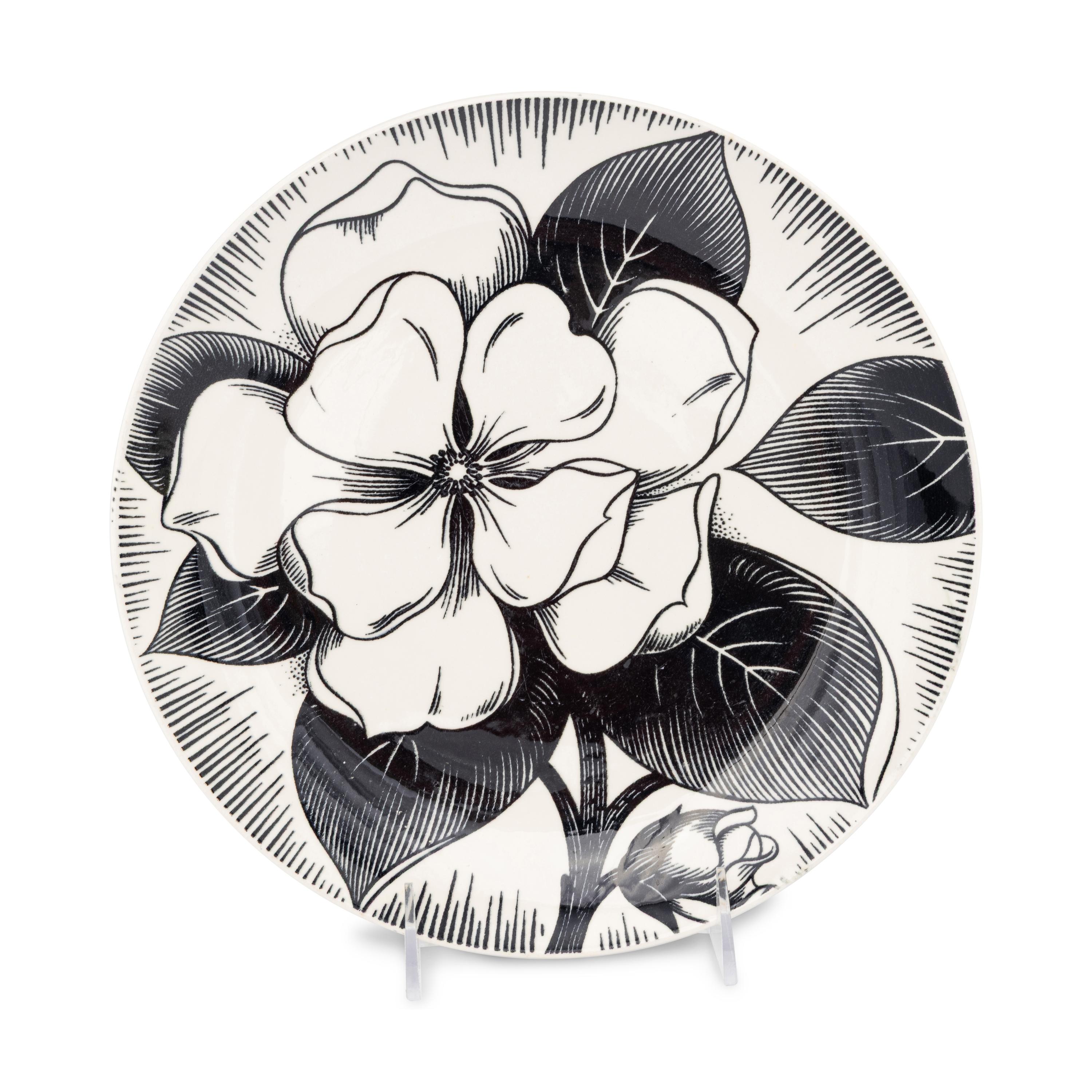 A Group of Six Ceramic Plates