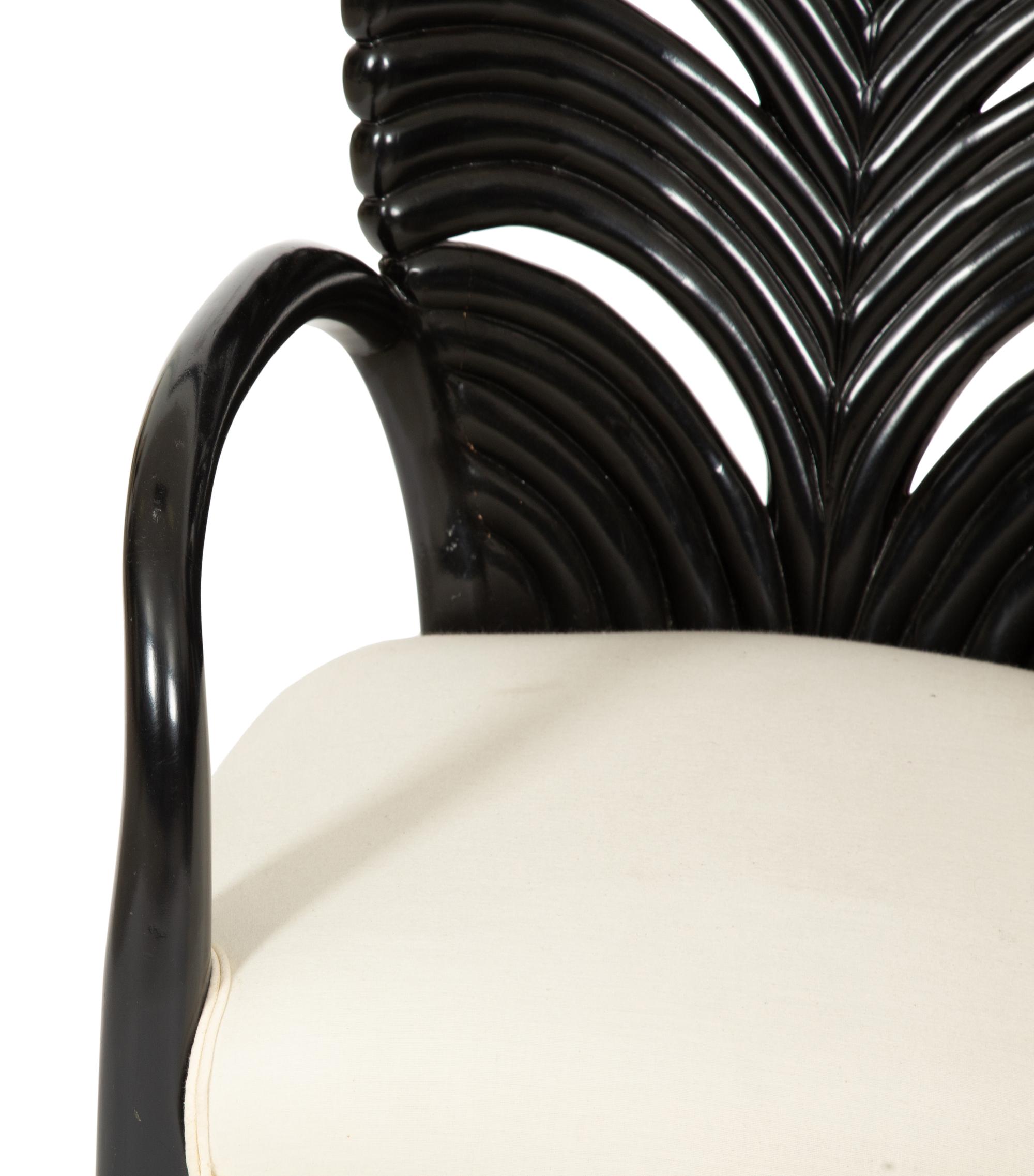 A Venetian Grotto Style Carved Black Lacquered Armchair