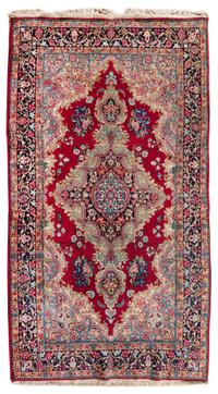 A Kirman Wool Rug 6 feet 9 inches x 3 feet 10 inches. — 20TH CENTURY