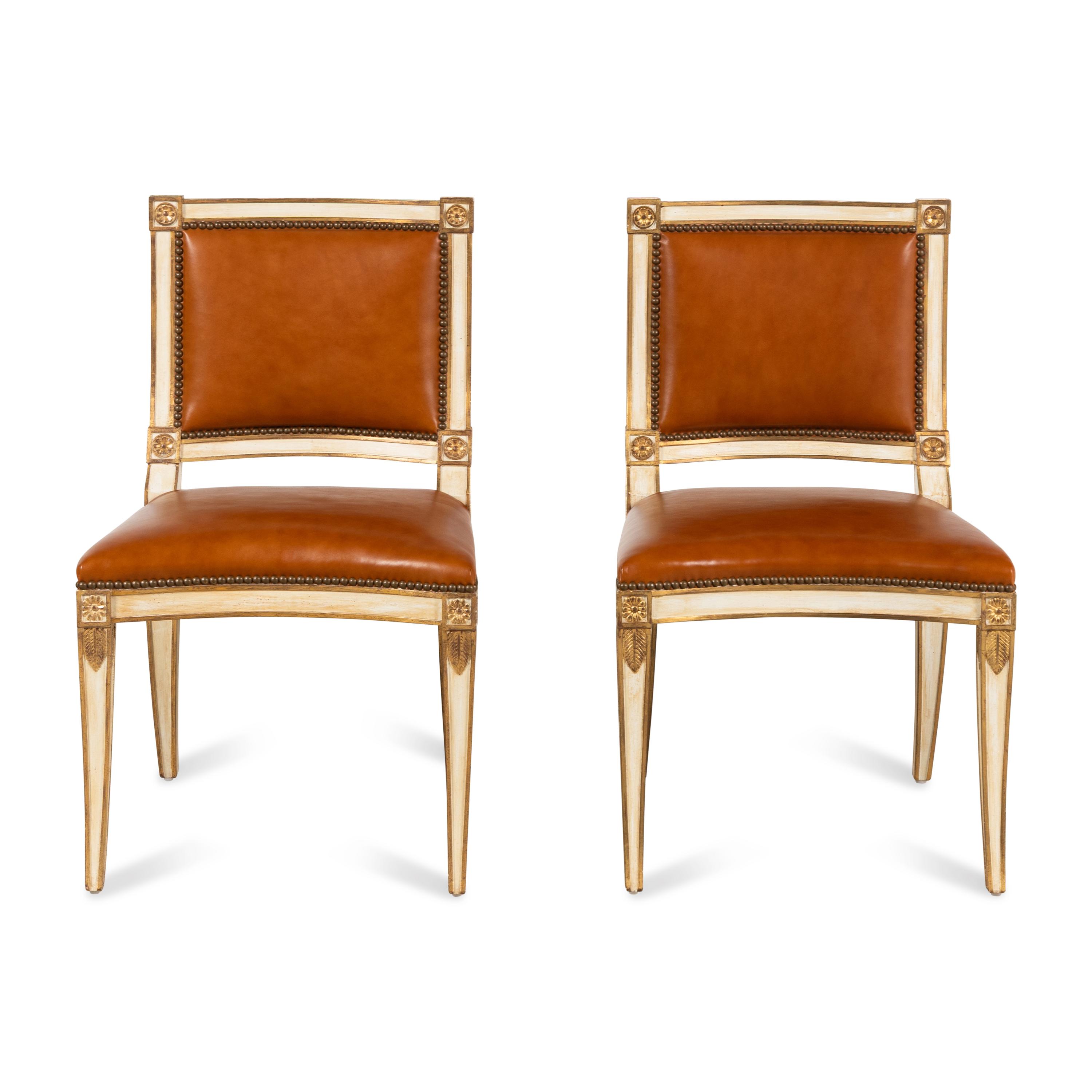 A Set of Twelve Italian Cream-Painted and Parcel Gilt Dining Chairs