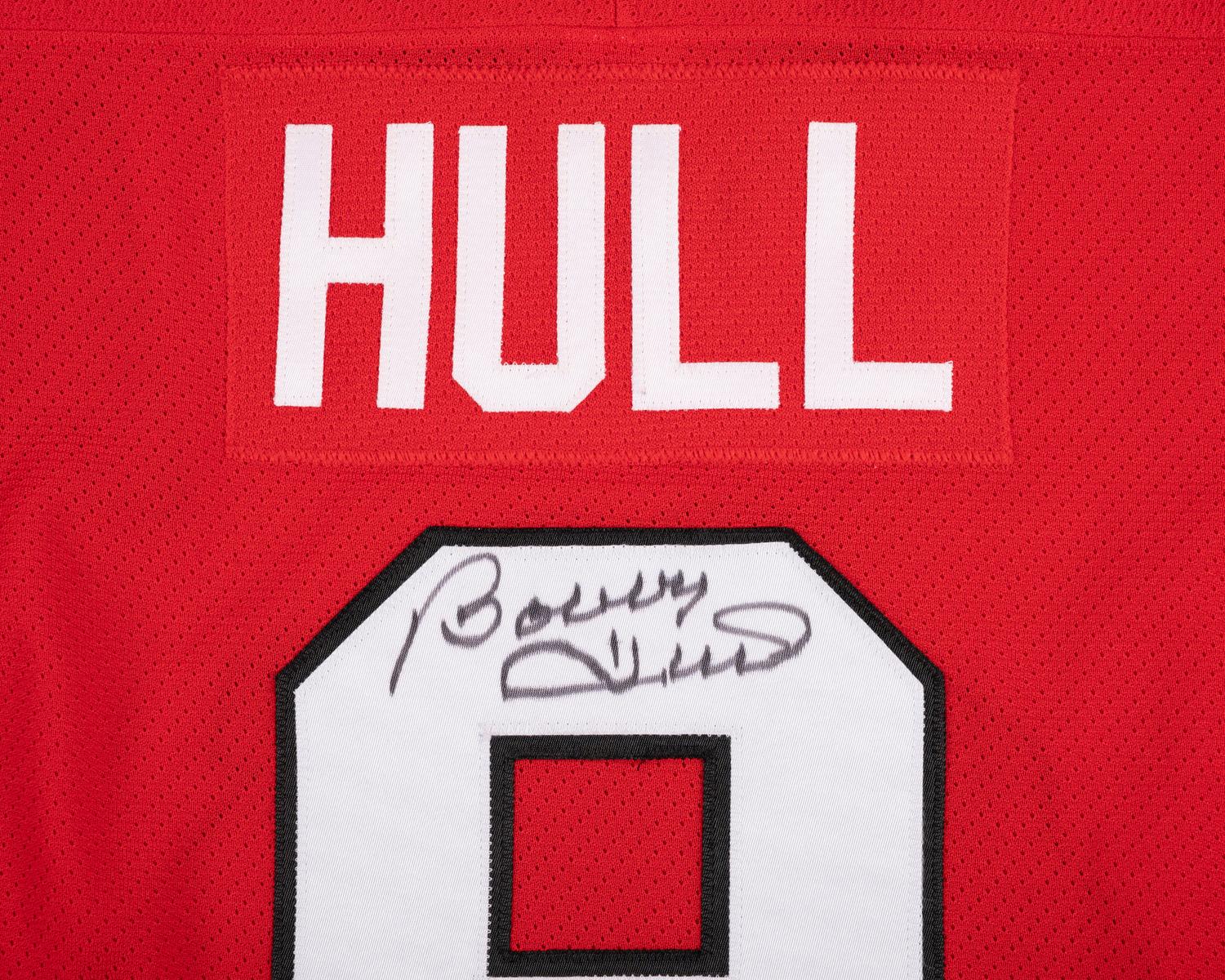 A Bobby Hull Signed Autograph Chicago Blackhawks Jersey and Hockey Stick (Beckett Authentication Services BAS Certfied),