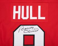 A Bobby Hull Signed Autograph Chicago Blackhawks Jersey and Hockey Stick (Beckett Authentication Services BAS Certfied),