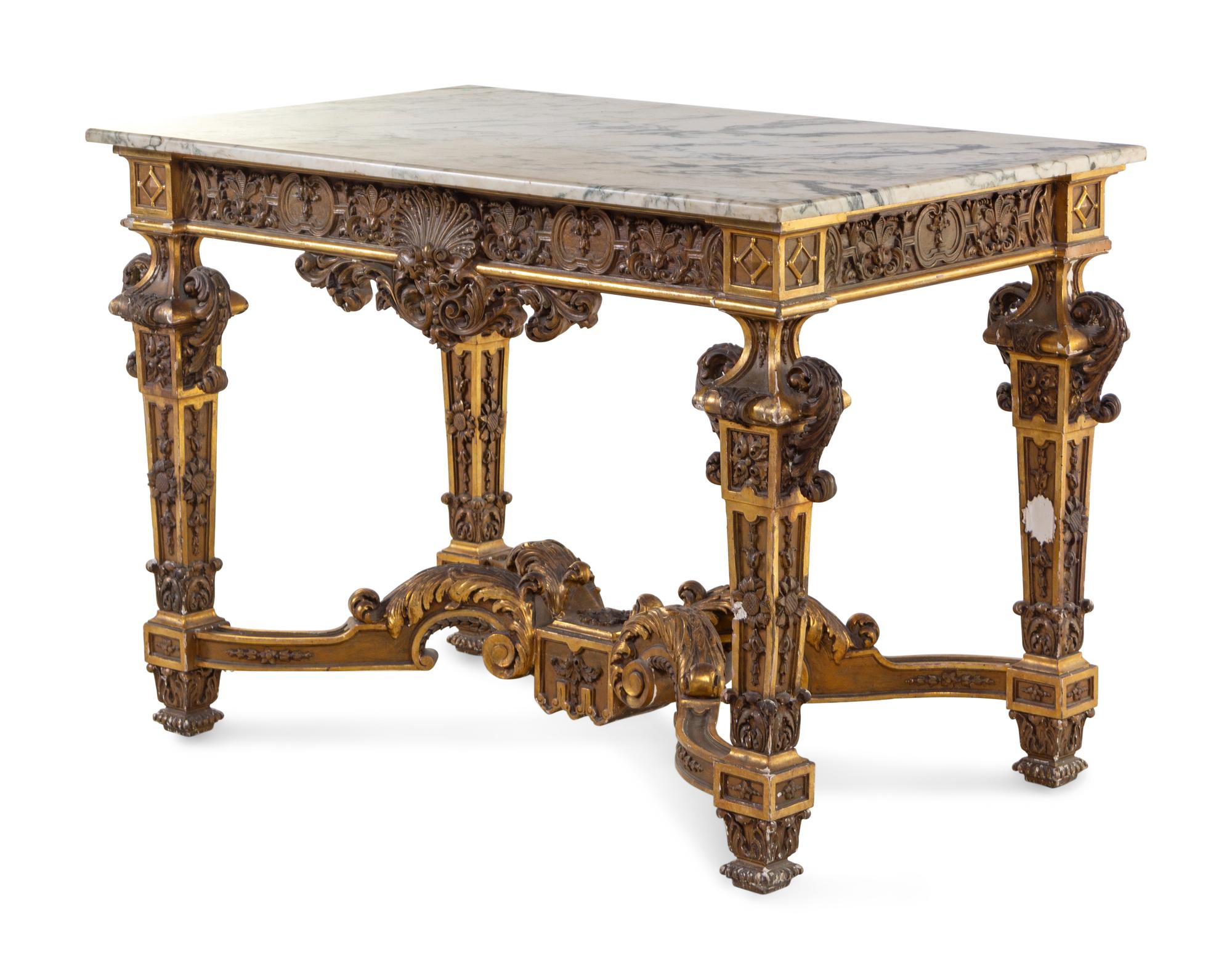 An Italian Carved Giltwood Marble-Top Center Table