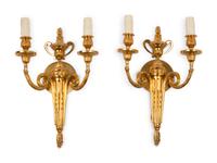 A Pair of Louis XVI Style Gilt Metal Two-Light Sconces