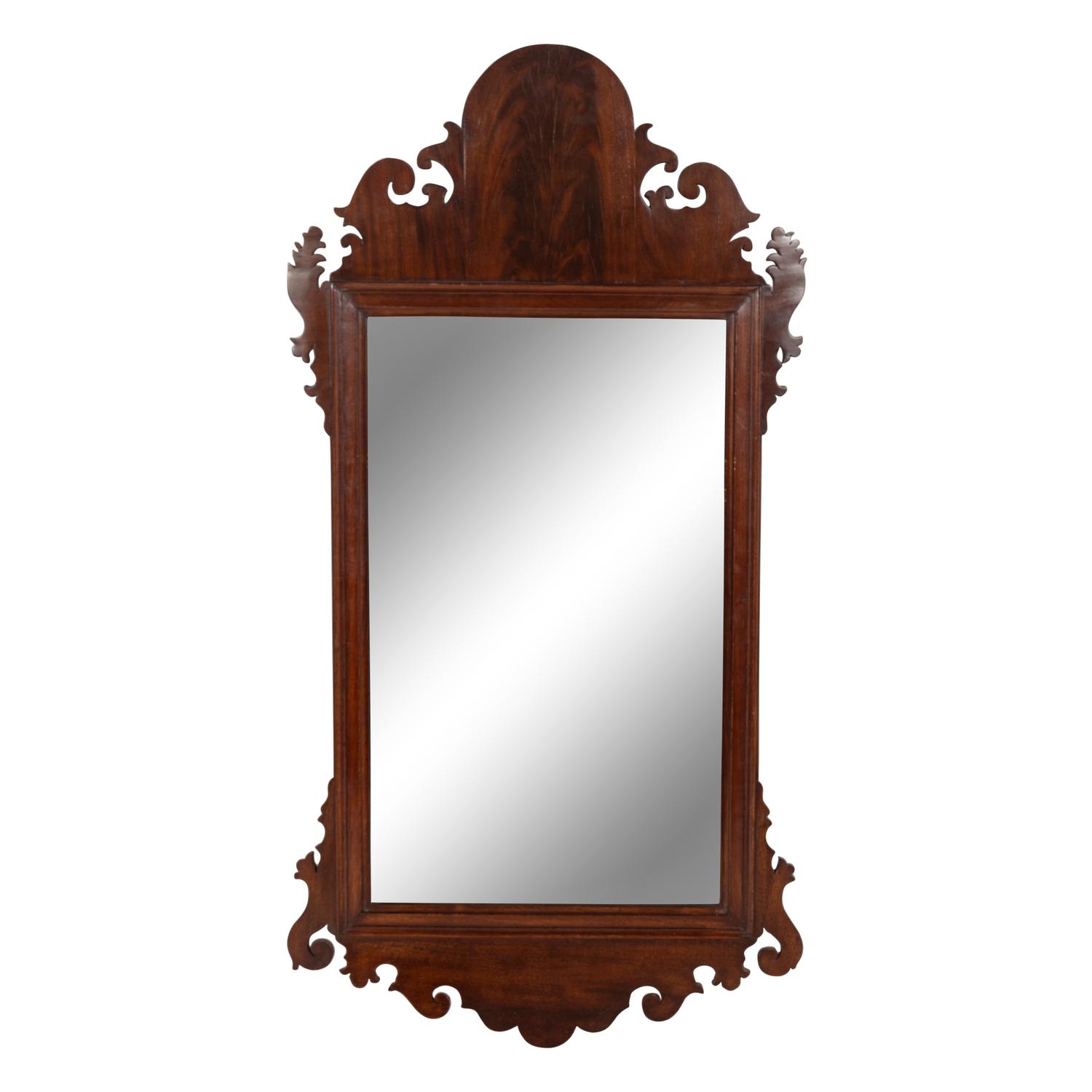 A Chippendale Carved and Figured Mahogany Looking Glass