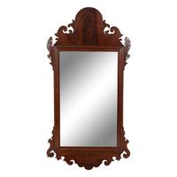 A Chippendale Carved and Figured Mahogany Looking Glass