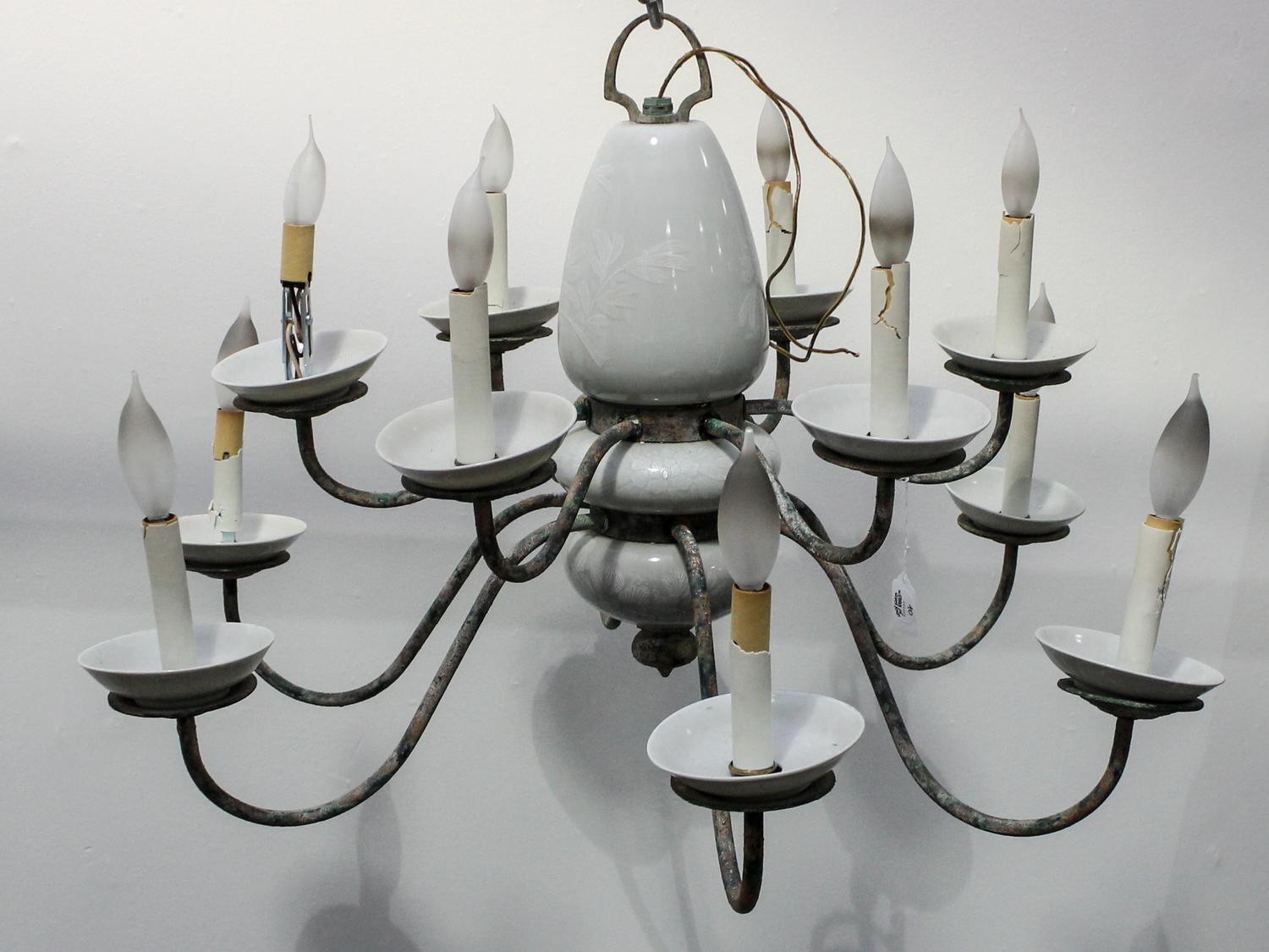 A Twelve Light Chandelier Height 19 x diameter 32 inches. — MID 20TH CENTURY