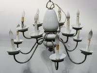A Twelve Light Chandelier Height 19 x diameter 32 inches. — MID 20TH CENTURY