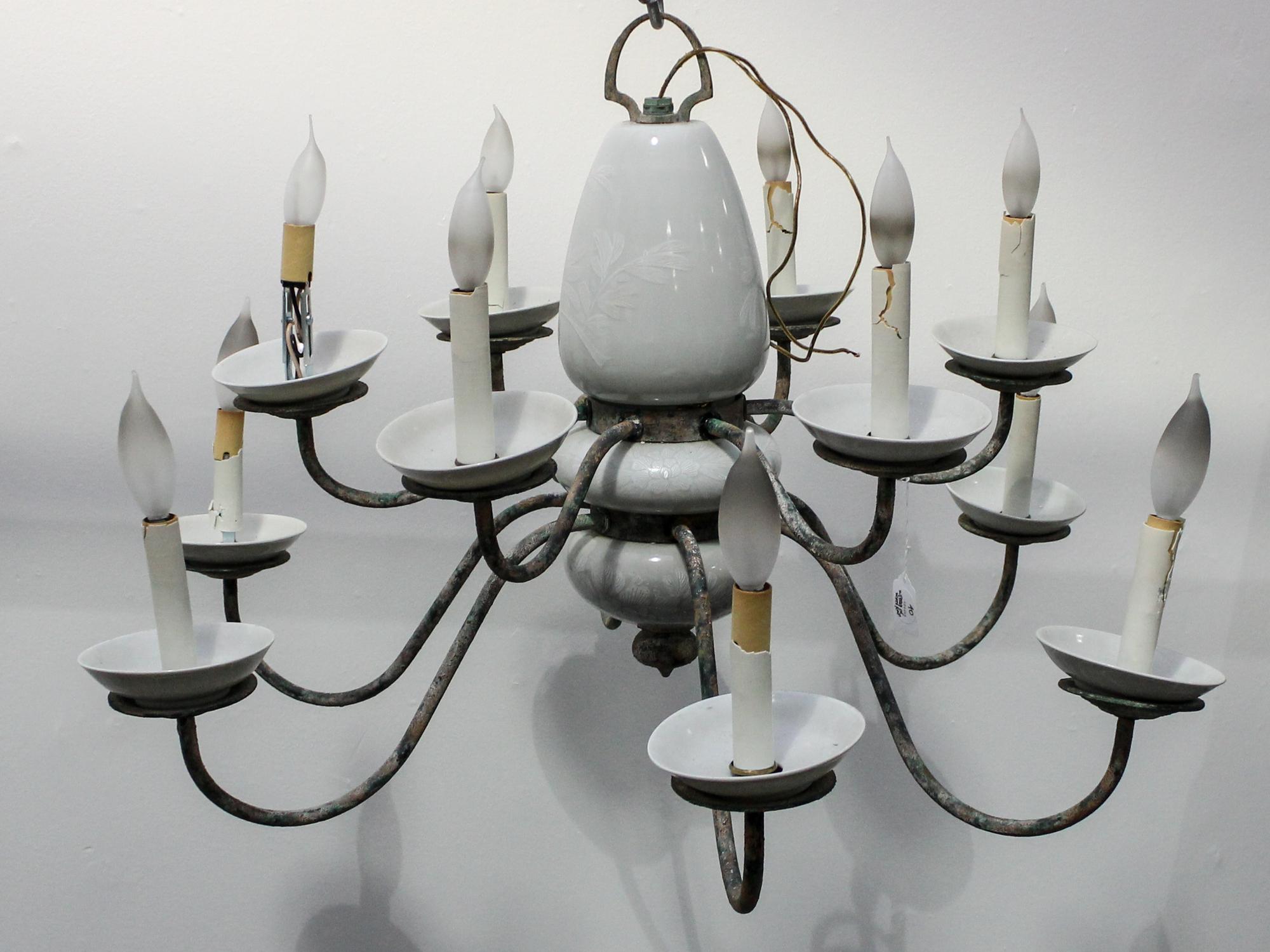 A Twelve Light Chandelier Height 19 x diameter 32 inches. — MID 20TH CENTURY