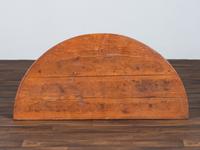 A Country Reddish Brown Painted Pine Demi-Lune Console Table