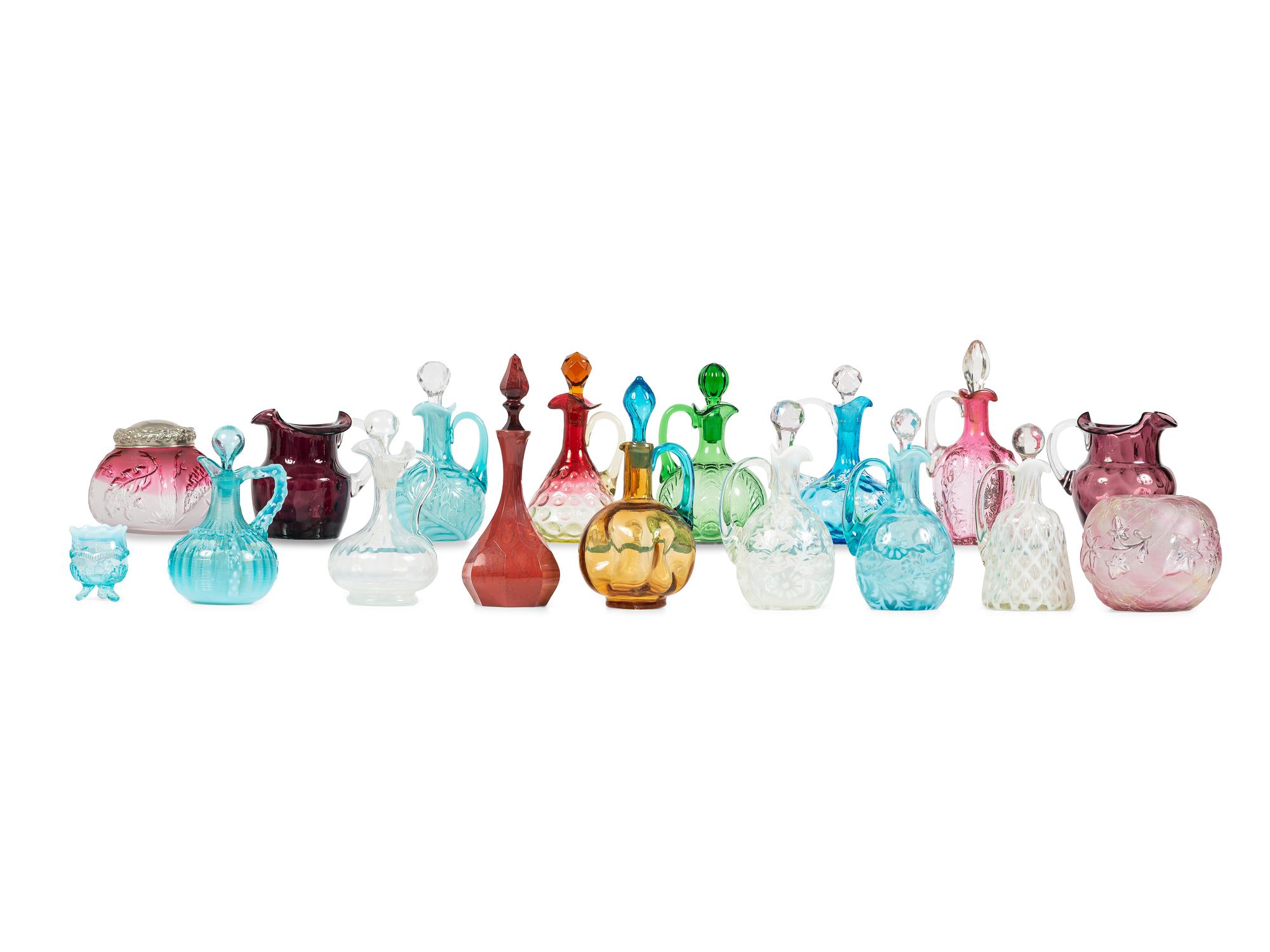 Seventeen Colored and Opal Glass Cruets, Pitchers, Toothpick Holders and Jars