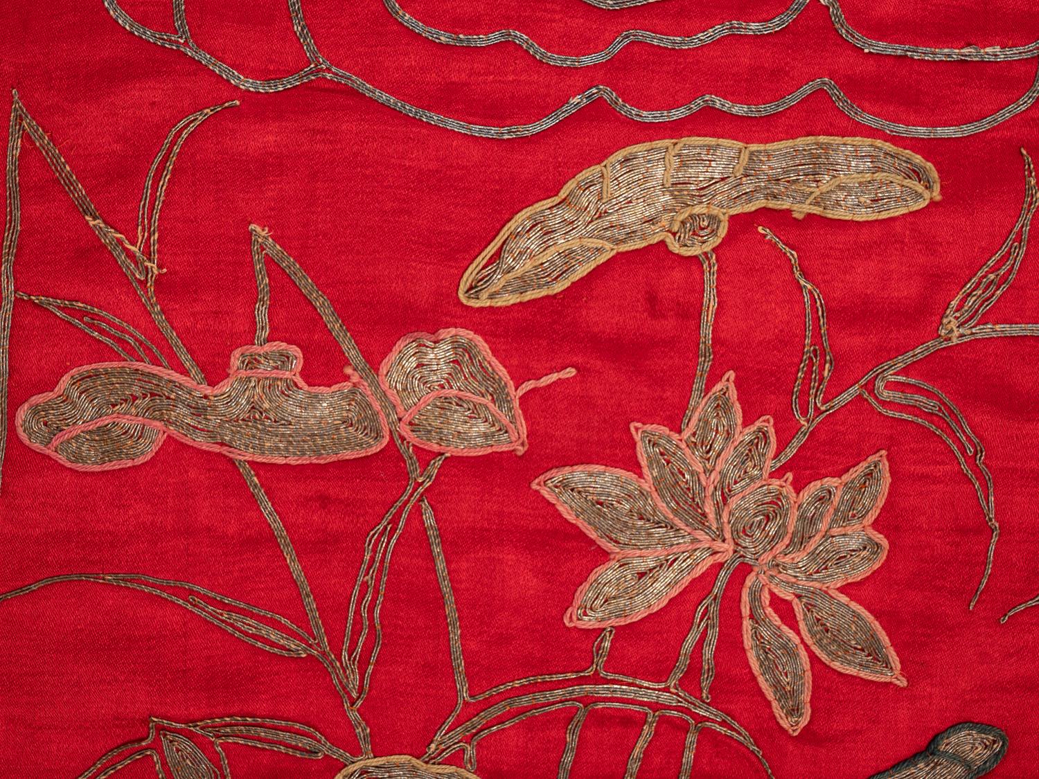 A Pair of Chinese Red Ground Embroidered Silk Panels