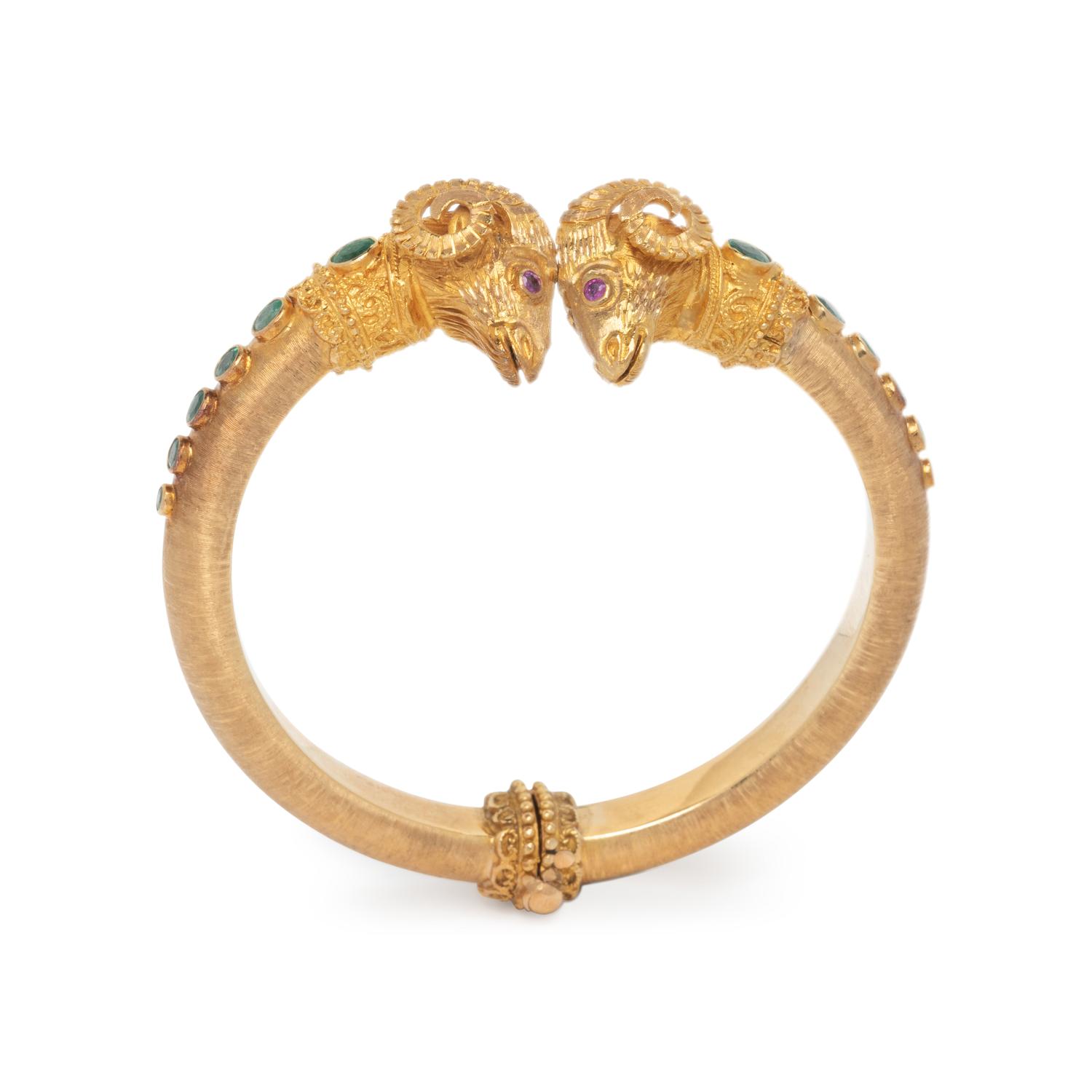 GREEK, YELLOW GOLD, EMERALD, AND RUBY RAM'S HEAD CUFF BRACELET