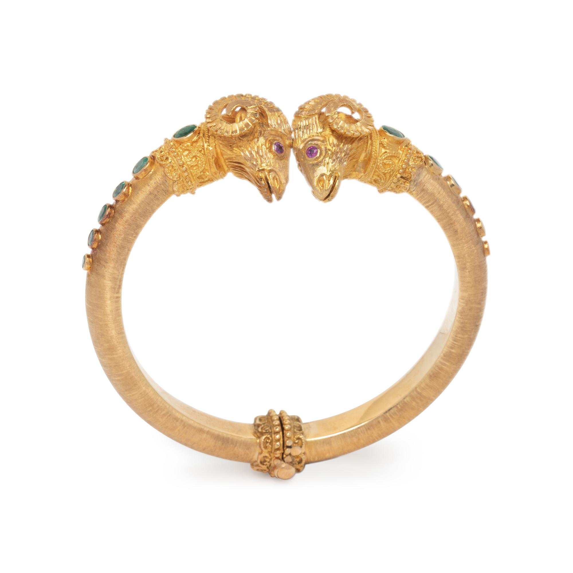 GREEK, YELLOW GOLD, EMERALD, AND RUBY RAM'S HEAD CUFF BRACELET