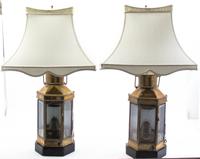 A Pair of Brass Ship Lanterns Height 32 1/2 inches.