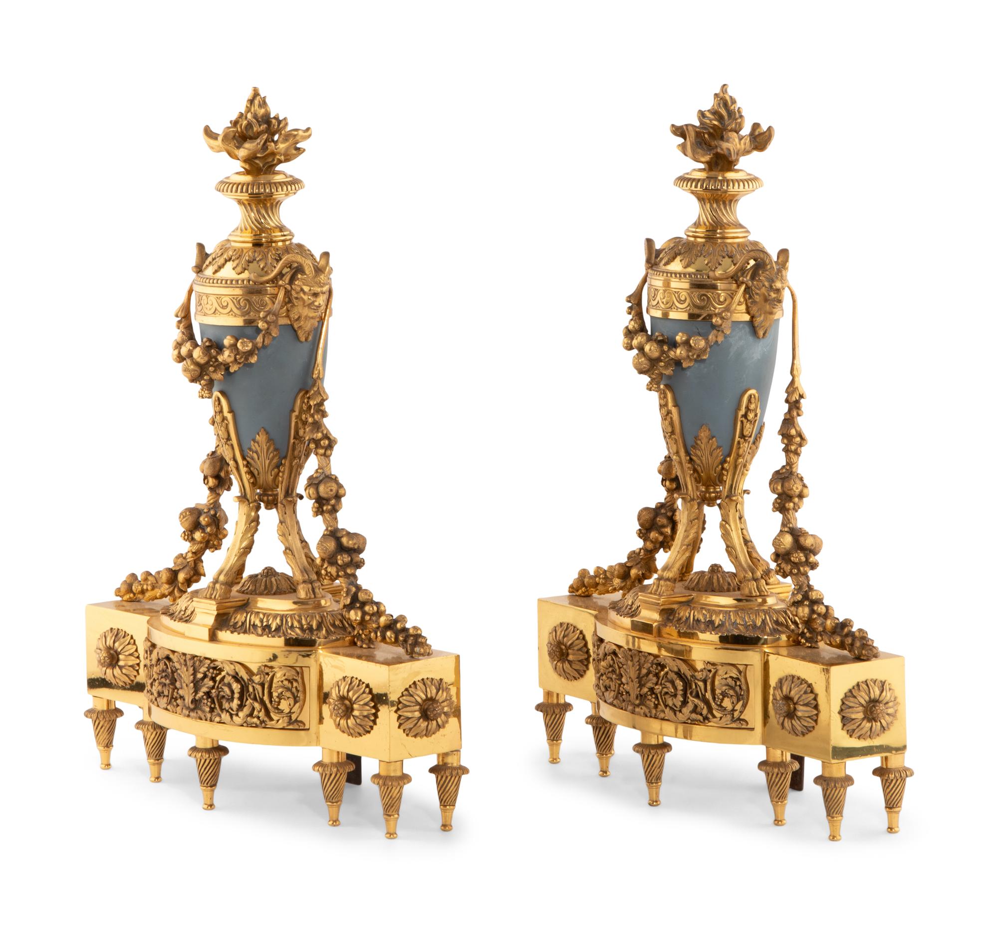 A Pair of French Gilt Bronze and Painted Tole Chenets