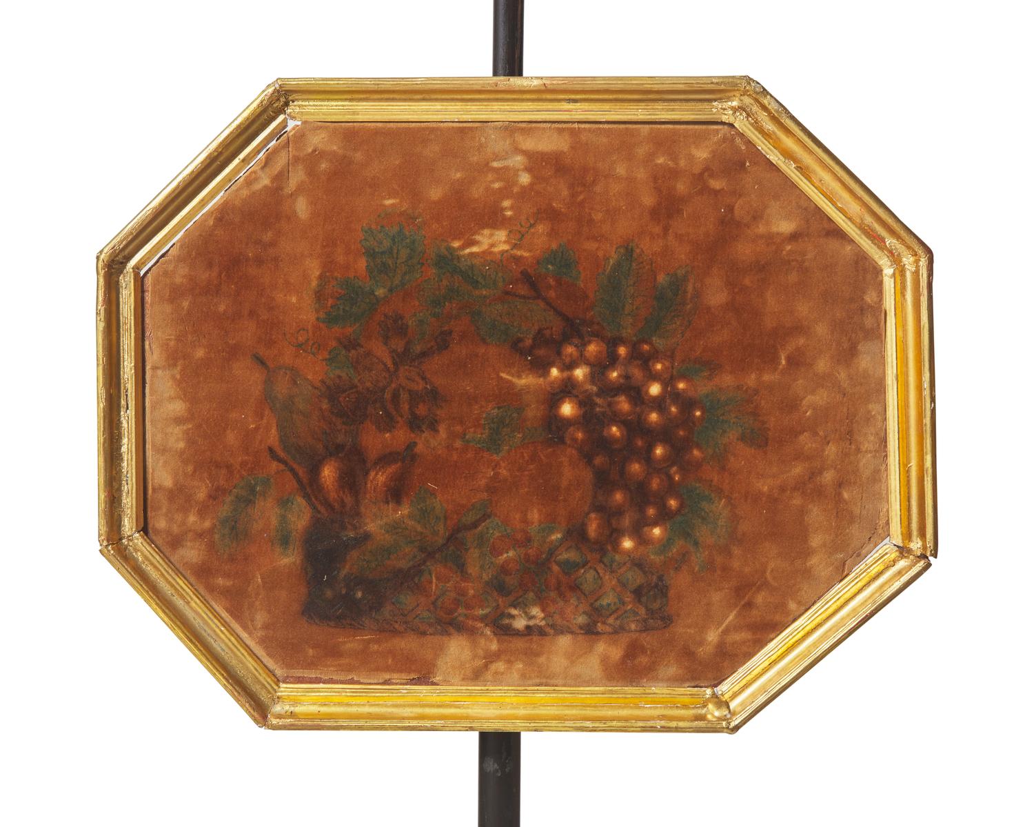 A pair of Regency ebonized and parcel-gilt firescreens with painted velvet theorem panels, circa 1820