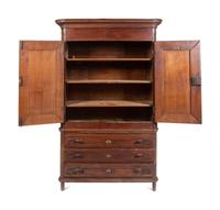 A Louis XV Carved Walnut Cabinet