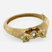 An 18K Yellow Gold and Diamond Panther Bracelet Swiss