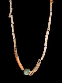 A Group of Four Pre-Columbian Articles: Whistle, Flute, Blade and Necklace