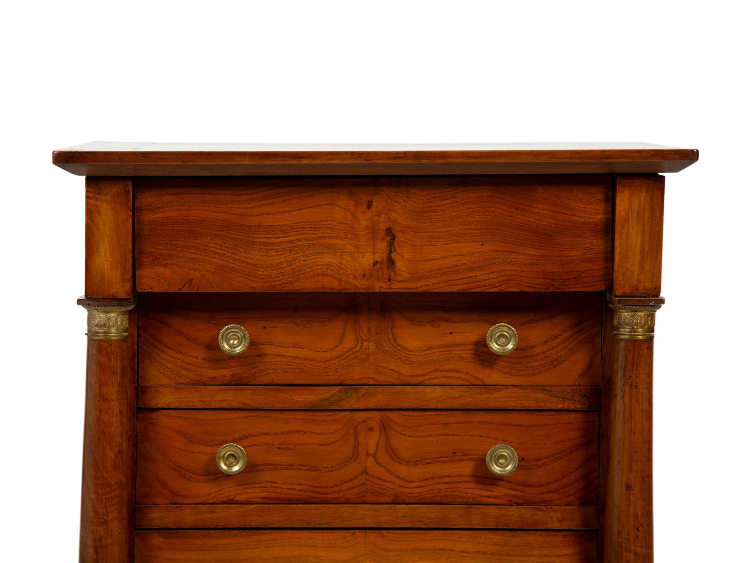 An Empire Gilt Bronze Mounted Walnut Diminutive Six-Drawer Chest — EARLY 19TH CENTURY