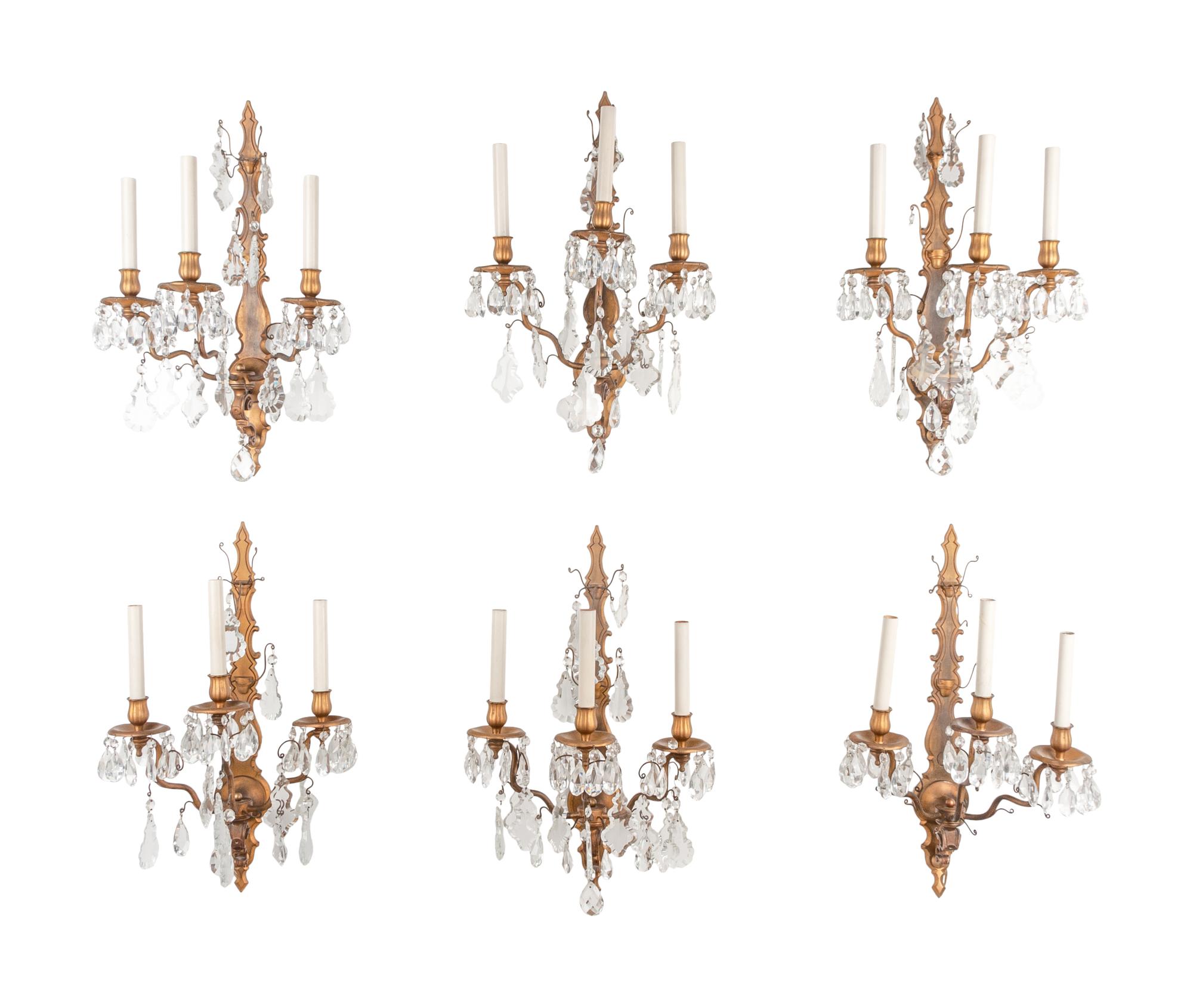 A Set of Six Napoleon III Style Gilt Metal and Glass Three-Light Sconces