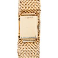 ALTAIR, YELLOW GOLD AND DIAMOND SURPRISE WATCH