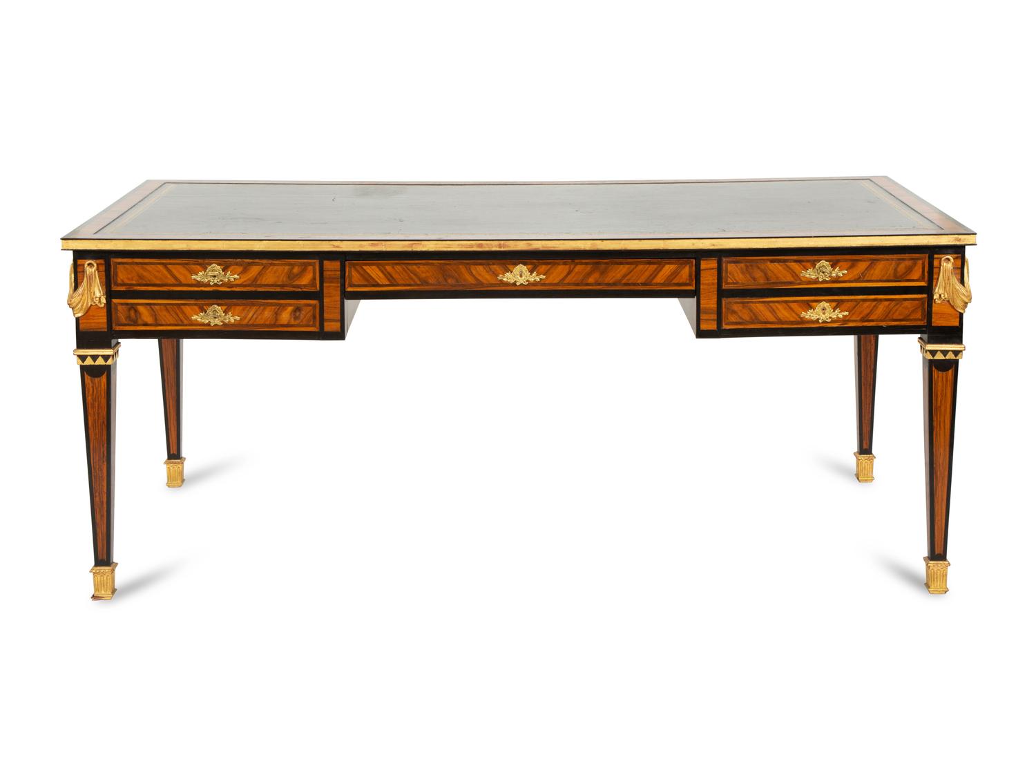 An Empire Style Cross Banded Walnut and Ebonized Bureau Plat