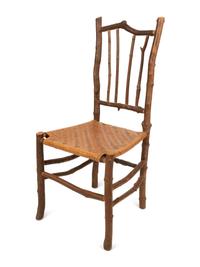 A Pair of Old Hickory Style Side Chairs with Reed Seats