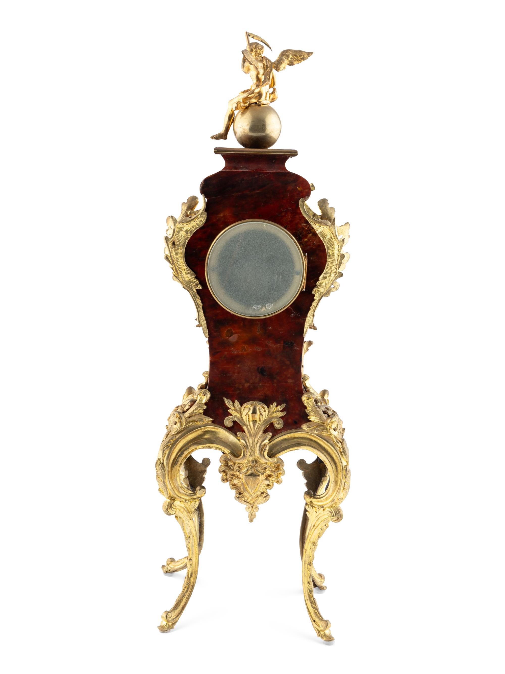 A Louis XV Style Gilt Metal and Faux Tortoise Shell Mantel Clock