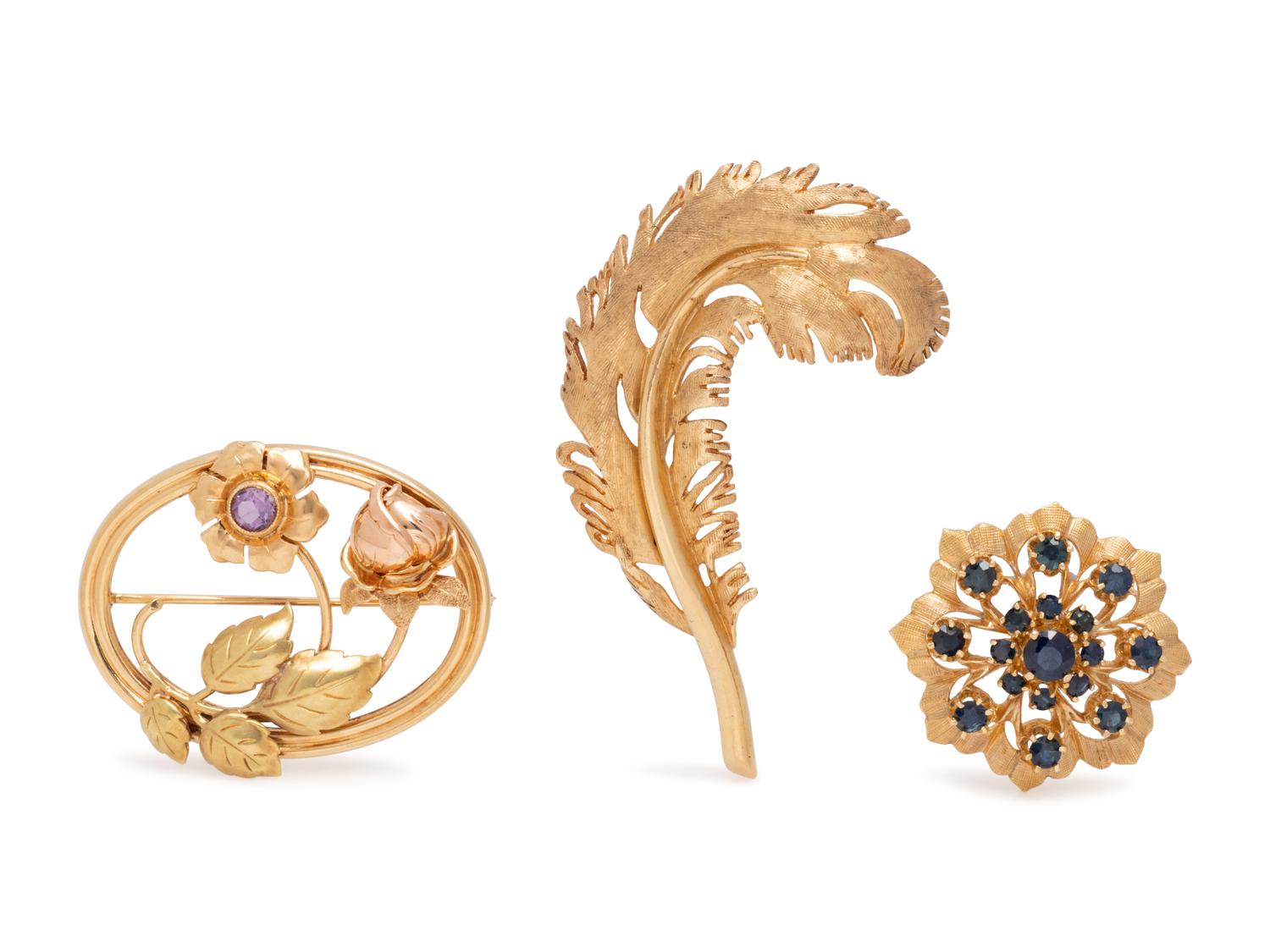 COLLECTION OF YELLOW GOLD BROOCHES
