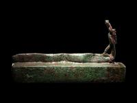 An Egyptian Bronze Snake Coffin