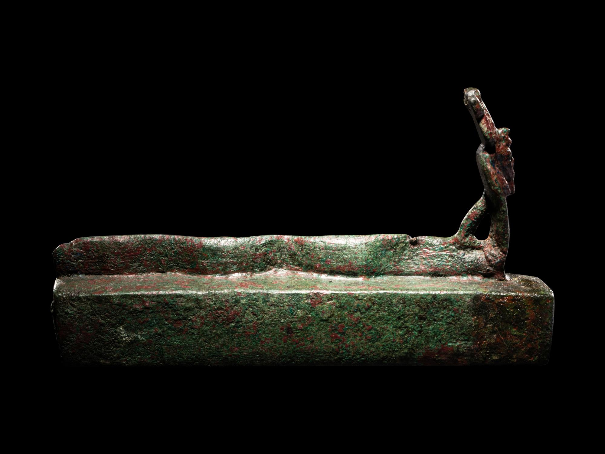 An Egyptian Bronze Snake Coffin