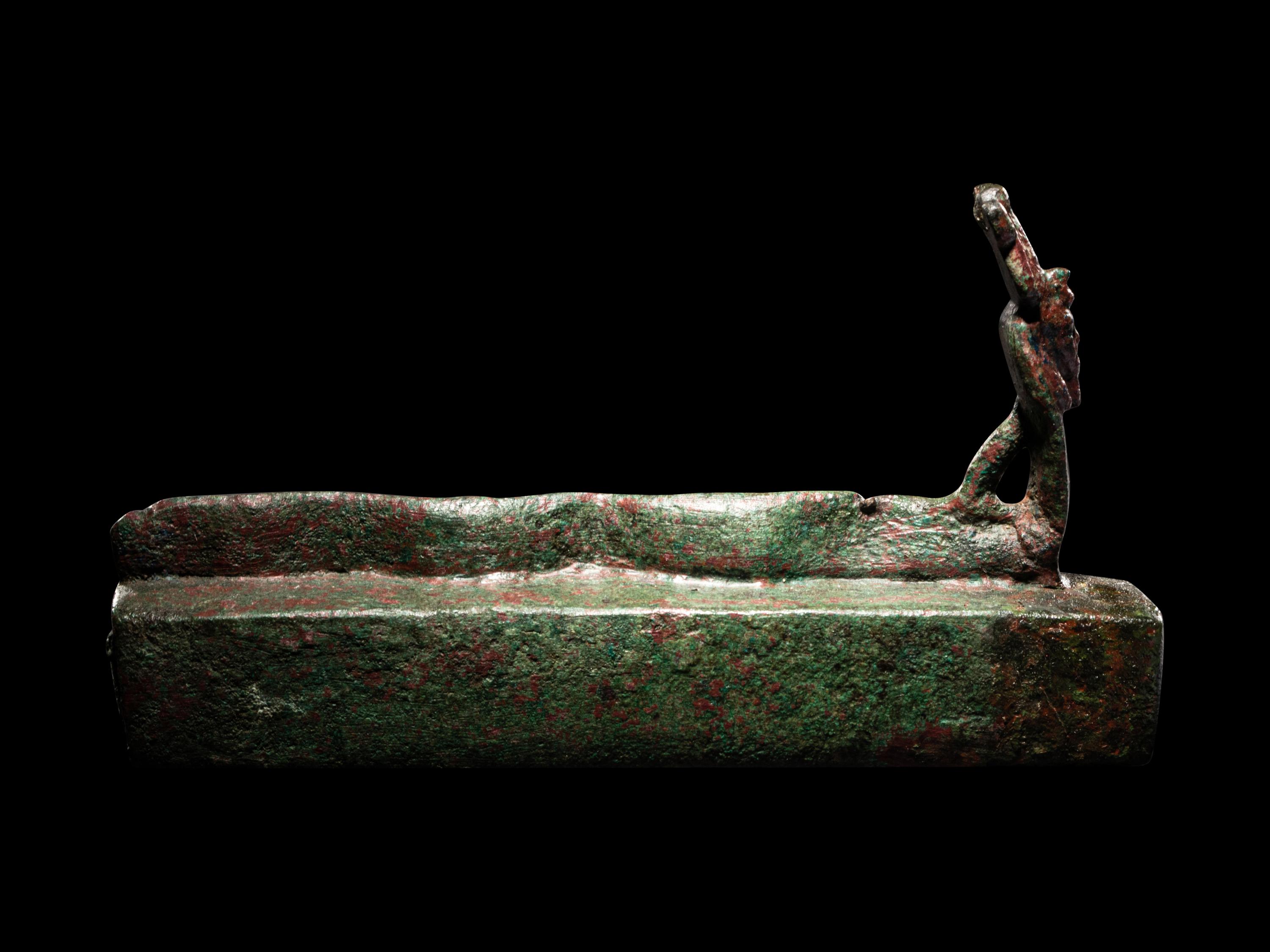 An Egyptian Bronze Snake Coffin