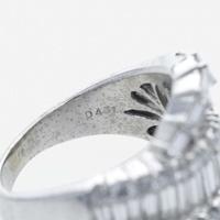 An 18K white gold and diamond ring