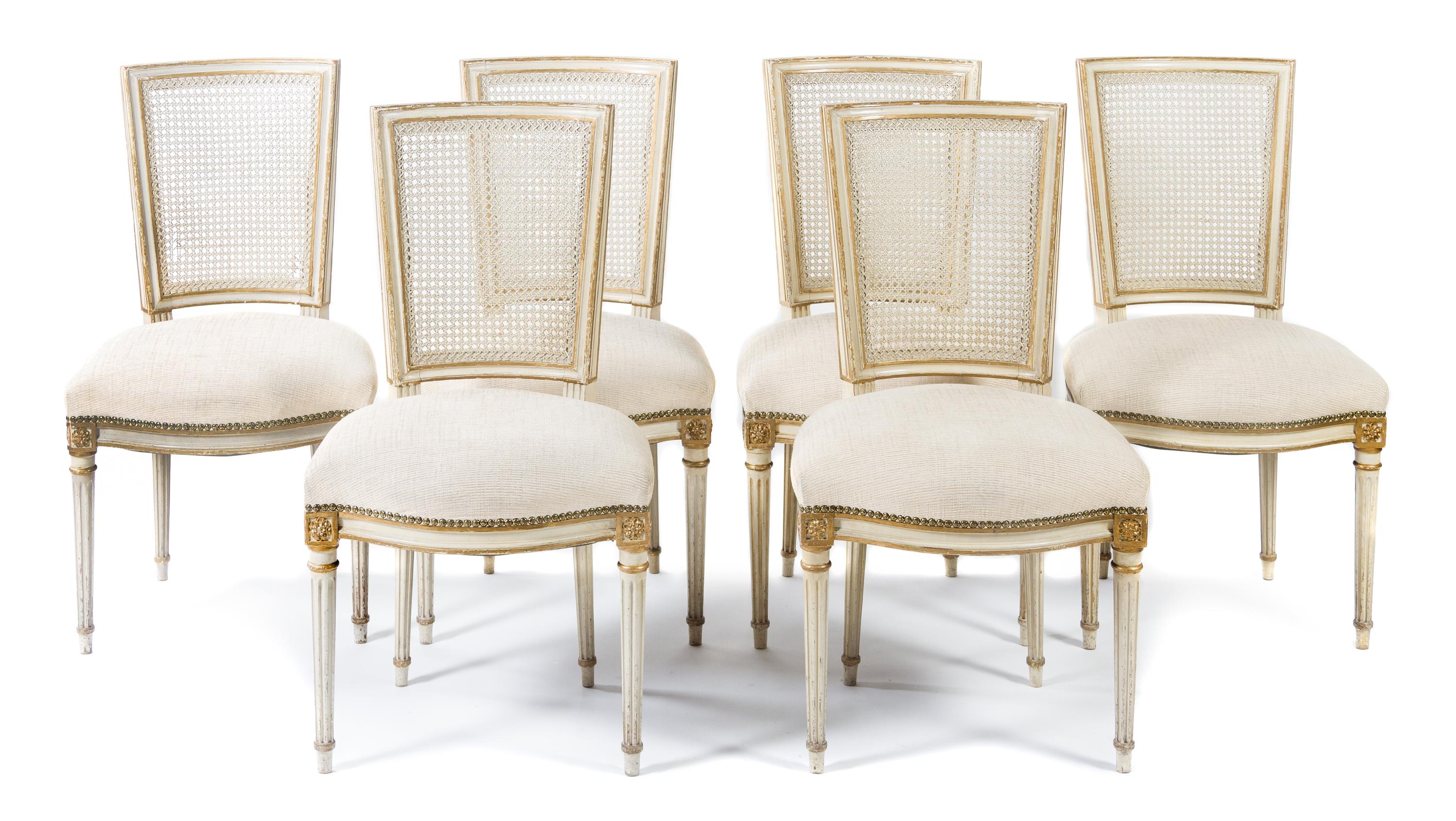 A Set of Six Louis XVI Style Painted and Parcel Gilt Dining Chairs Height 35 1/2 inches. — FIRST HALF 20TH CENTURY