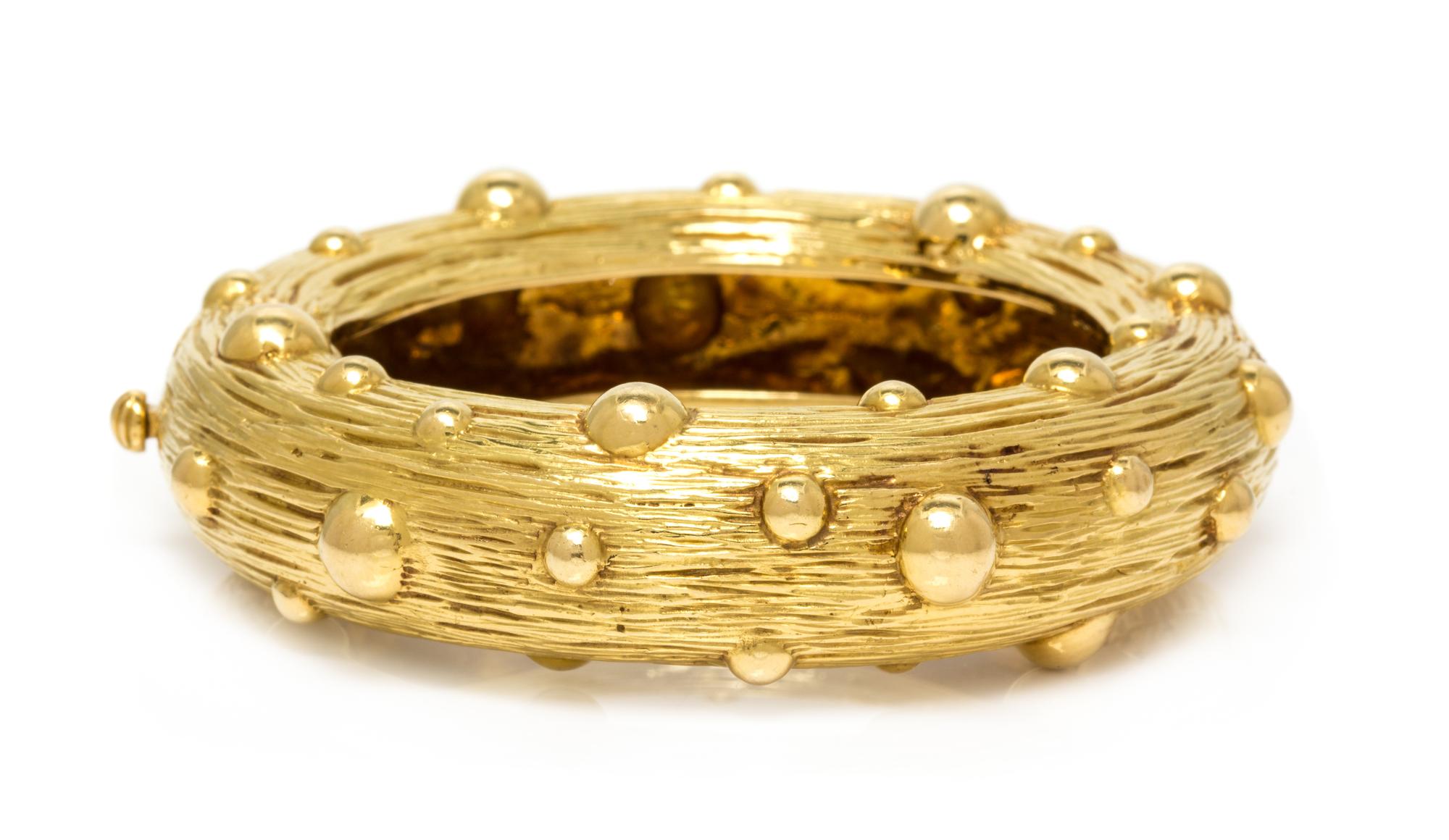 An 18 Karat Yellow Gold Bangle Bracelet, Tiffany & Co., Circa 1968-1969, 66.05 dwts.