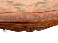 A Pair of Louis XV Style Oak Fauteuils