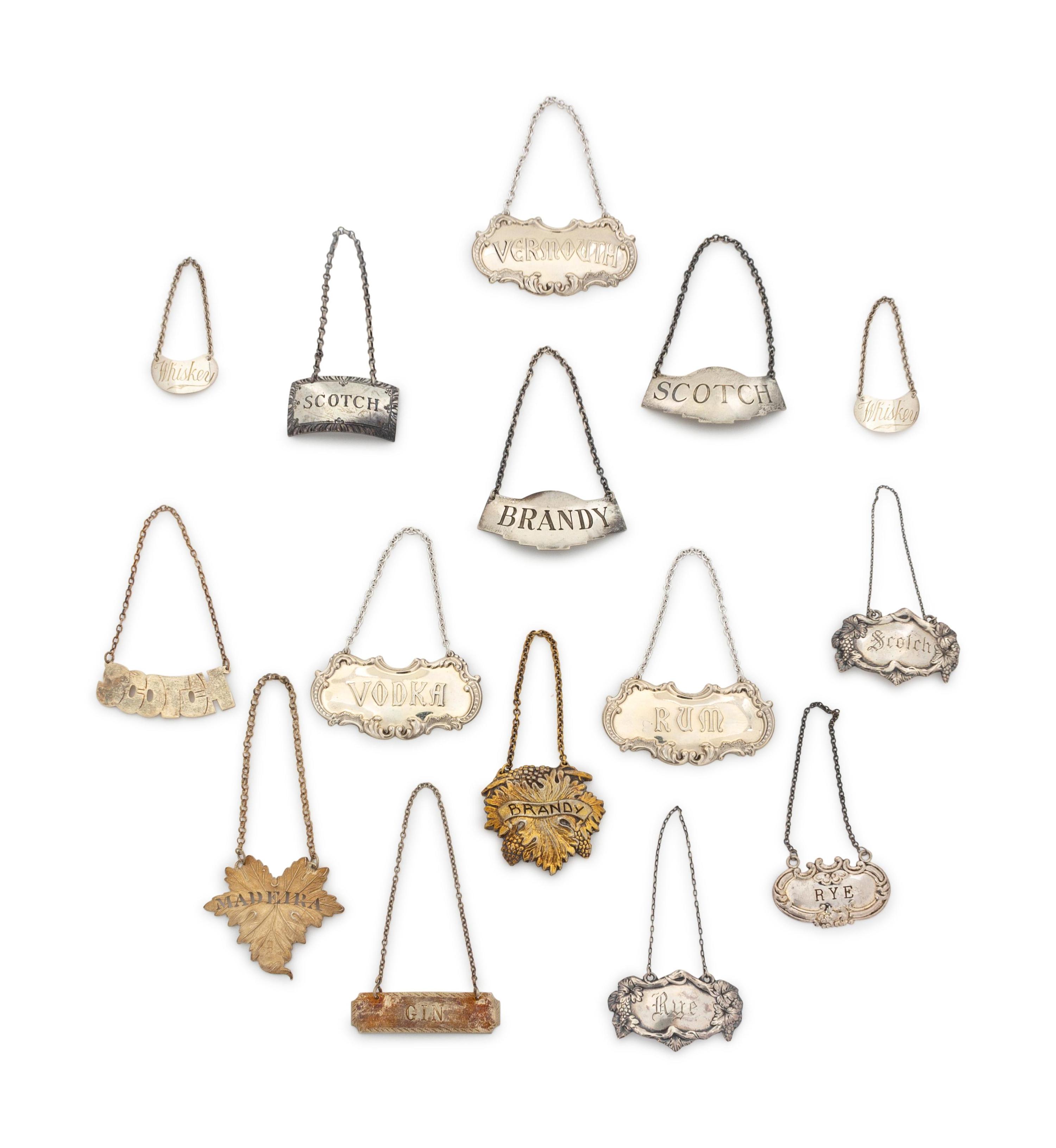A Collection of Thirteen Silver Liquor Tags