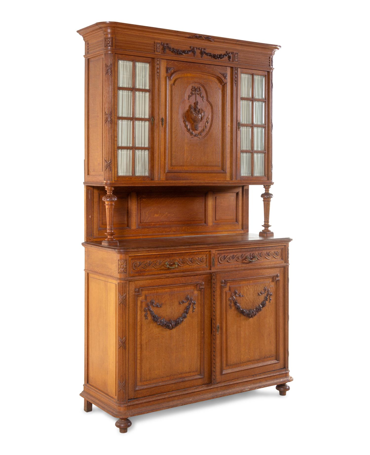 A French Carved Oak Buffet à Deux Corps
