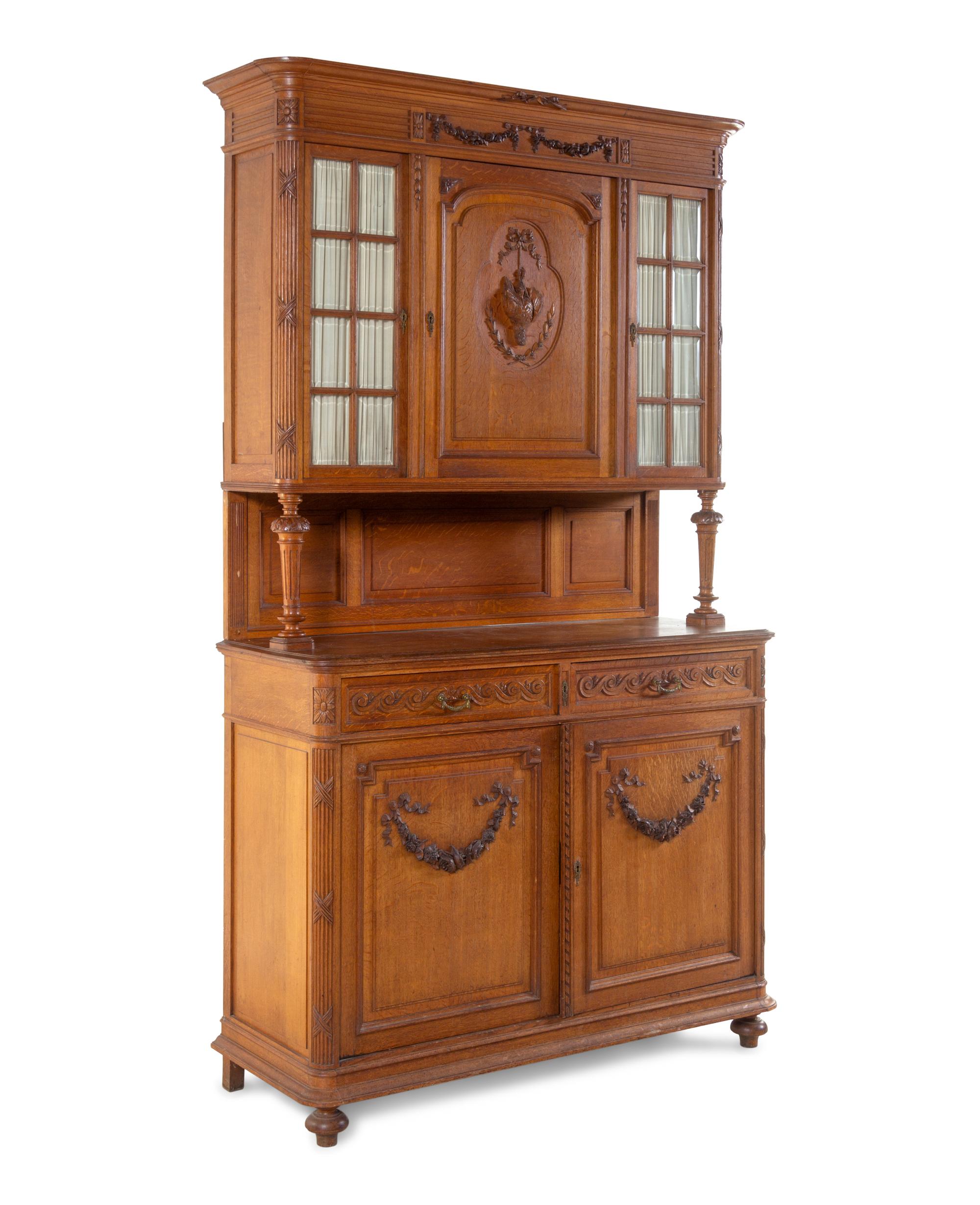 A French Carved Oak Buffet à Deux Corps