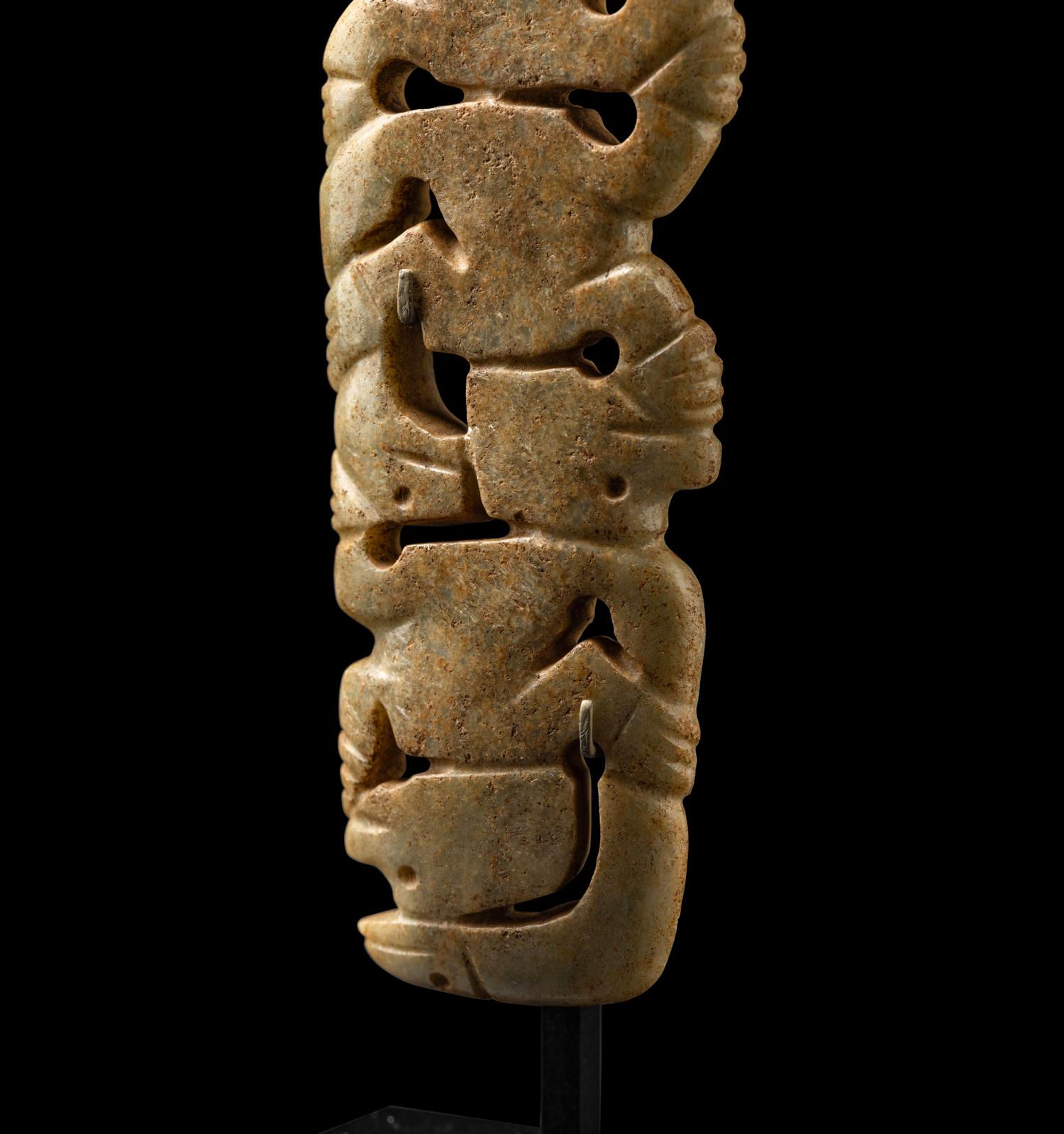 A Costa Rican White-Jade Snake and Monkey Pendant