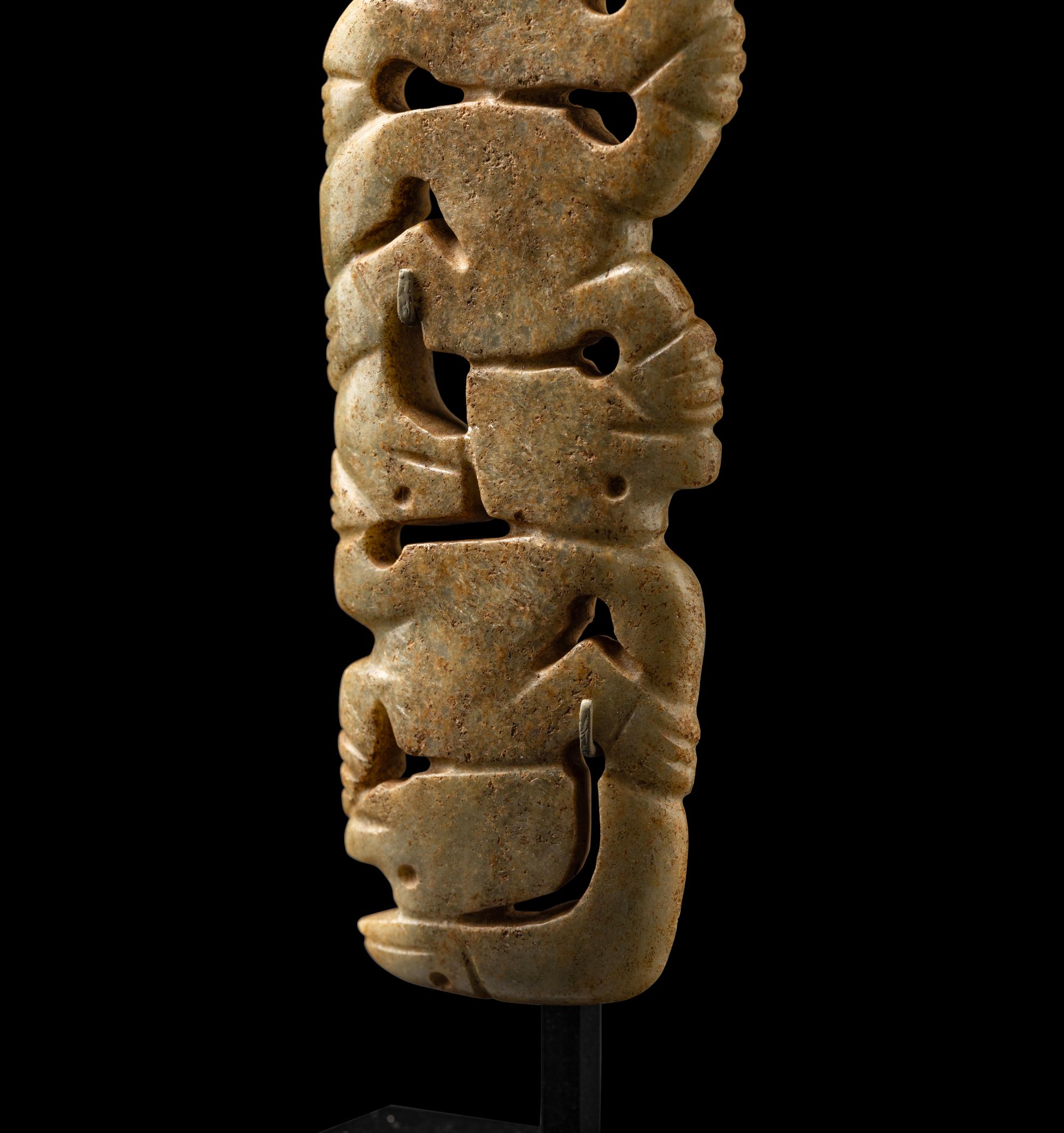 A Costa Rican White-Jade Snake and Monkey Pendant