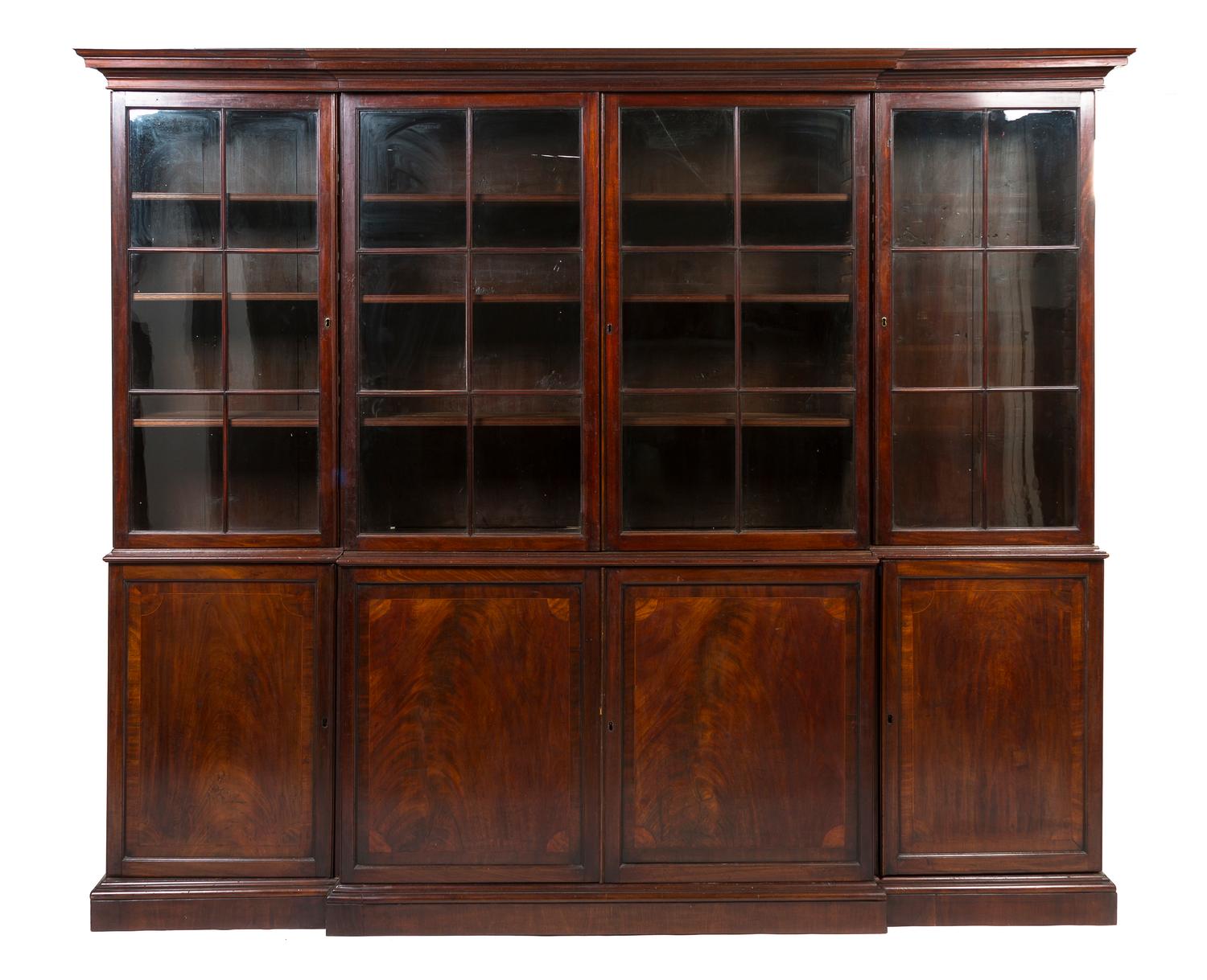 A George III Style Mahogany Breakfront Bookcase, Height 90 x width 103 x depth 16 inches.