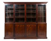 A George III Style Mahogany Breakfront Bookcase, Height 90 x width 103 x depth 16 inches.