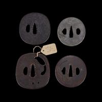 Group of twelve assorted Japanese iron tsuba