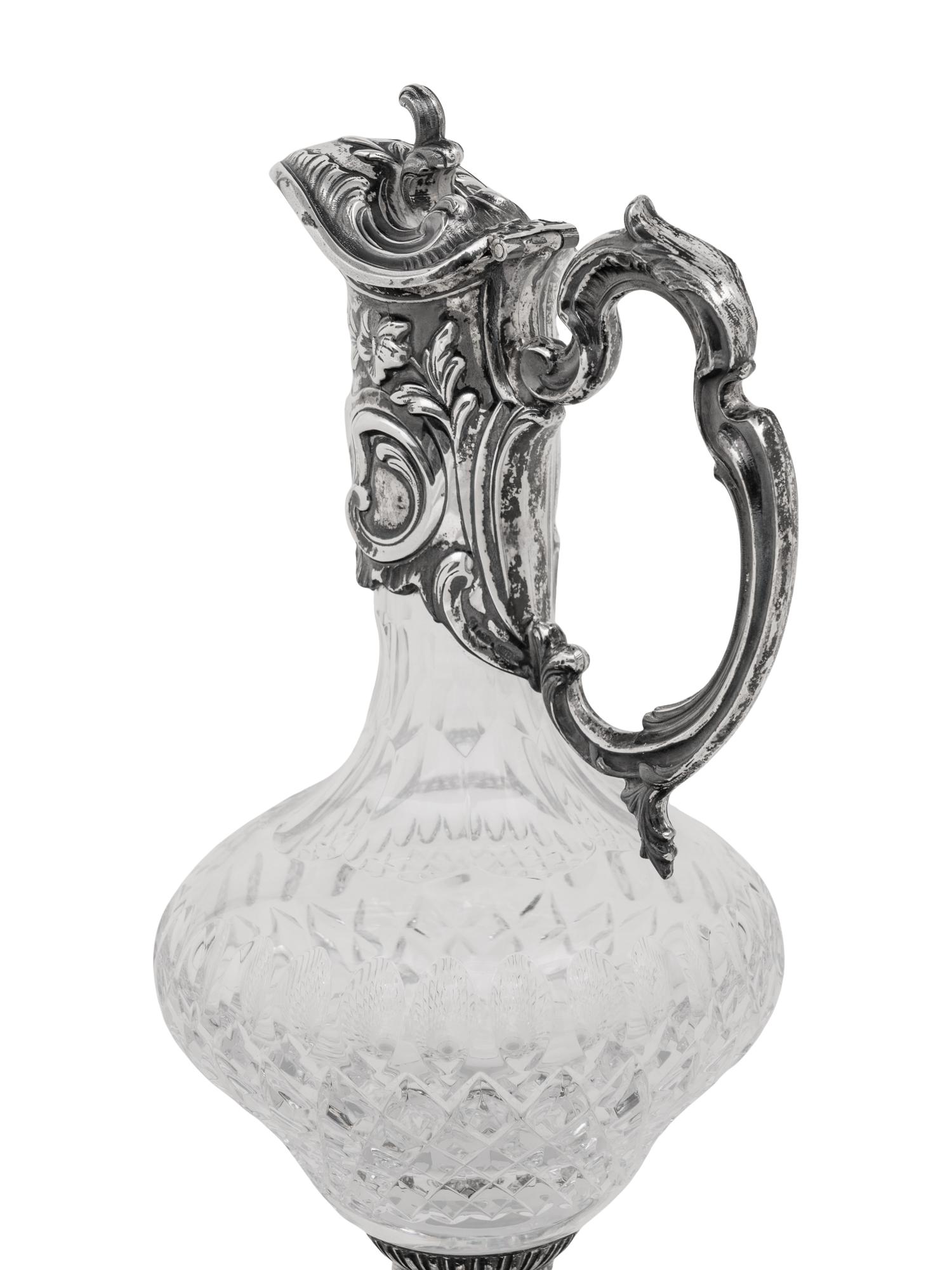 A Portuguese Silver Mounted Cut Glass Claret Jug