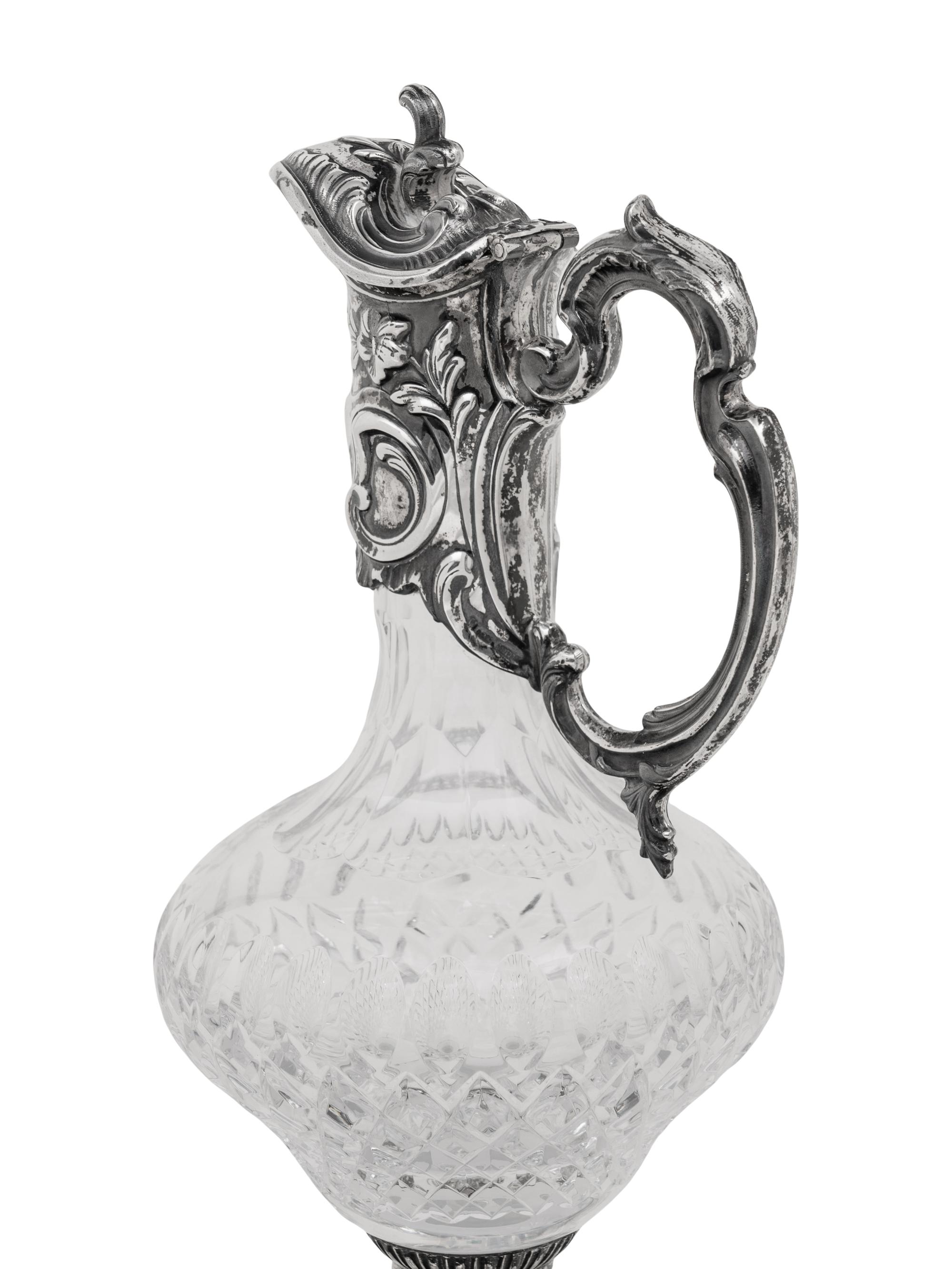 A Portuguese Silver Mounted Cut Glass Claret Jug