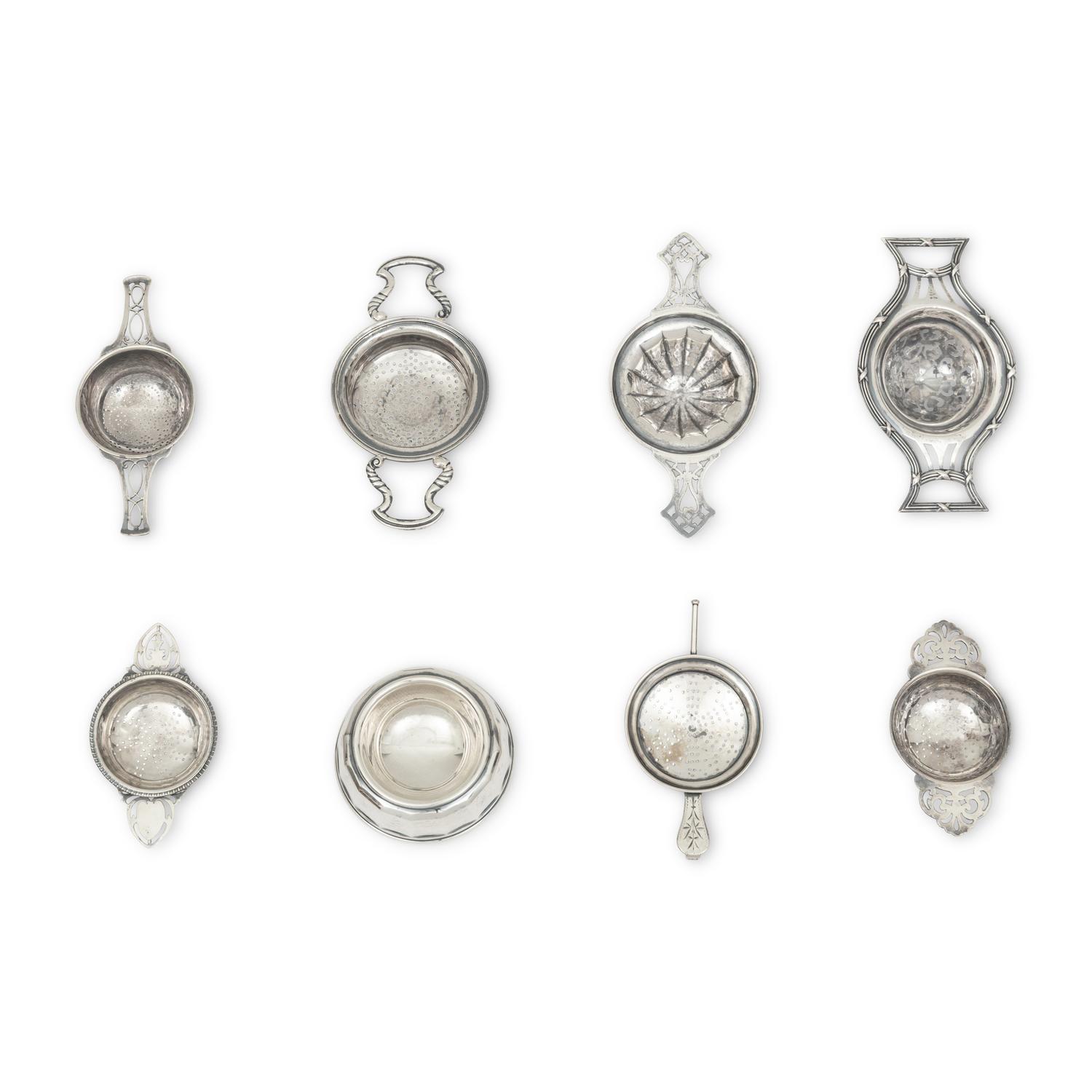 A Collection of Twenty Silver Tea Strainers