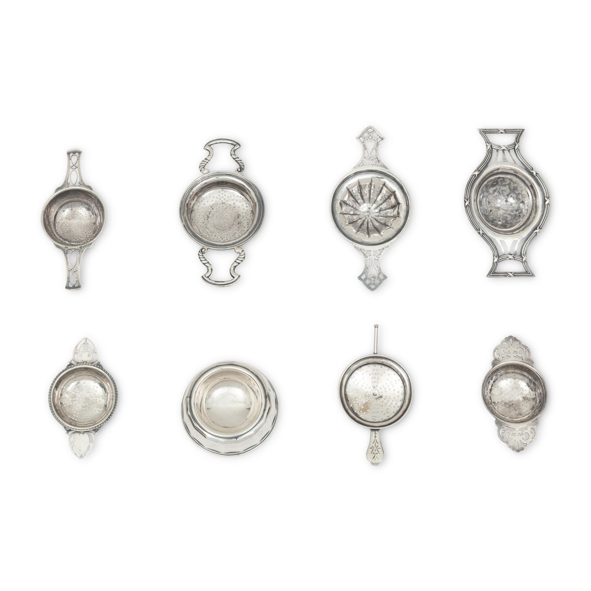 A Collection of Twenty Silver Tea Strainers